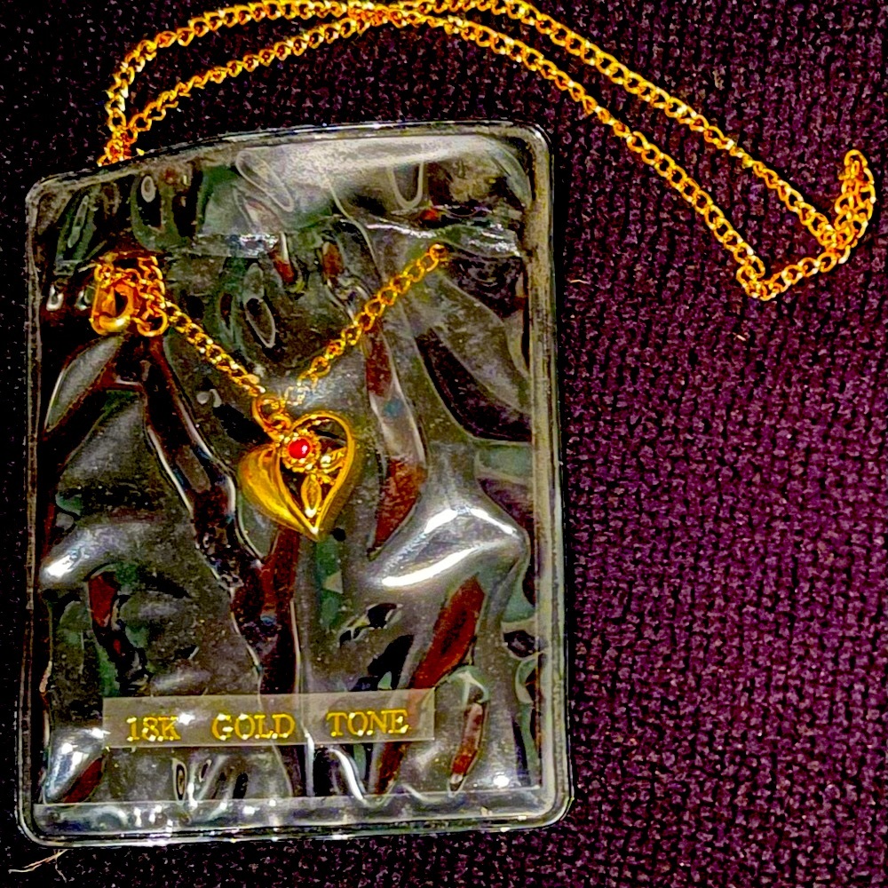 18k gold tone necklace with heart and leaves pendant with ruby gem